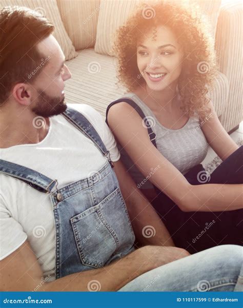 Close Up Of A Happy Married Couple Sitting In A New Apartment Stock Image Image Of Enjoying