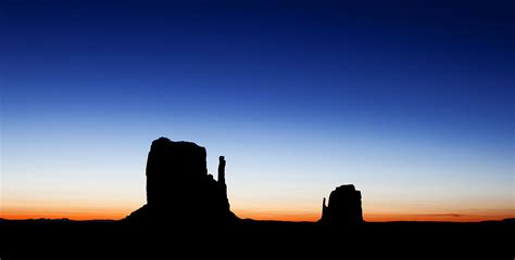 Silhouette Of The Mitten Buttes In Monument Valley Photograph By Good