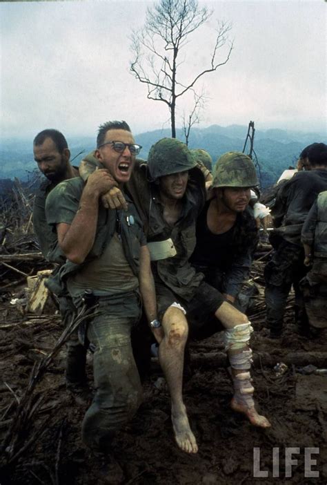 Wounded American Marines Being Treated And Prepared For Evacuation