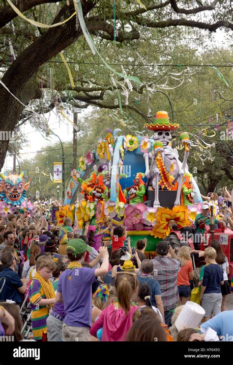 A Parade Float With Crowd Of Revelers On Mardi Gras Day In New Orleans