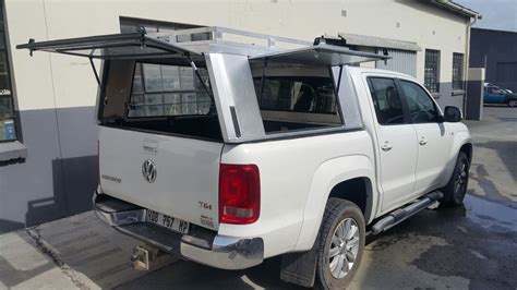Ripstop canvass, tubular steel frame.worked like a dream, have used it for two trips but no longer needed. VW Amarok MK2 | Razorback Aluminium Canopies