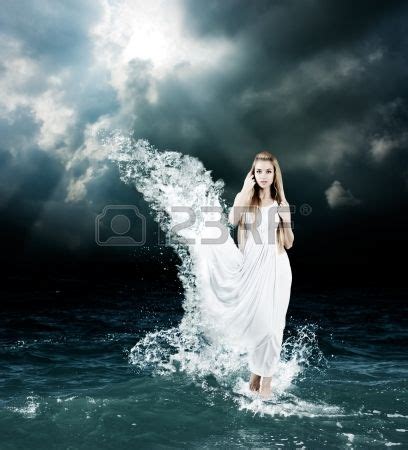 Woman In Splashing Dress Walking On Stormy Sea Aphrodite Godess Stormy Sea Aphrodite Godess