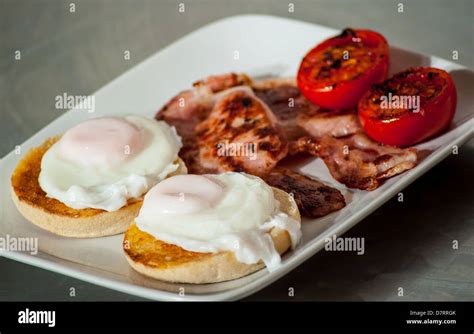 A Healthy English Breakfast 2 Poached Eggs On Muffins With Grilled