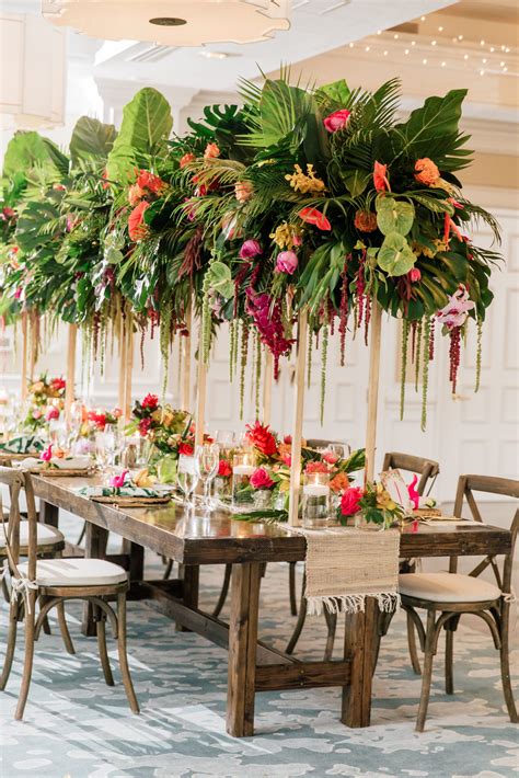 Tall tropical greenery garden wedding centerpiece | Tropical wedding