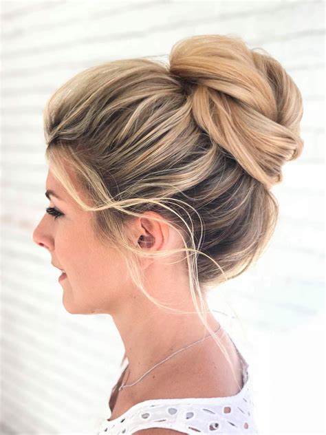 Messy High Bun On Blonde Highlighted Hair Gorgeous For A Wedding Updo