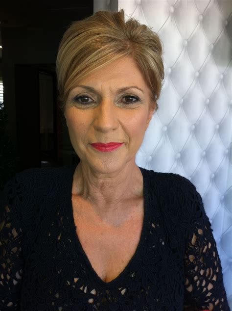 beautiful look for a more mature woman especially the lipstick brings youth and feshness to