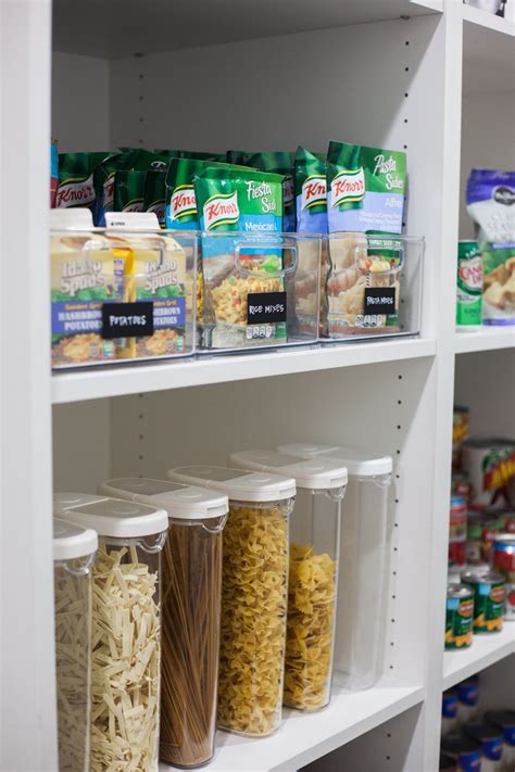 This heavy steel rack can hold multiple items in your kitchen such as paper towels, food wrap, and foil. Our Home: Pantry+ 5 Organizing Tips | Food storage cabinet ...