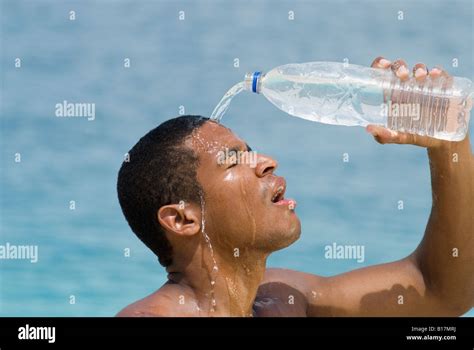 Pouring Water Into Mouth Hi Res Stock Photography And Images Alamy