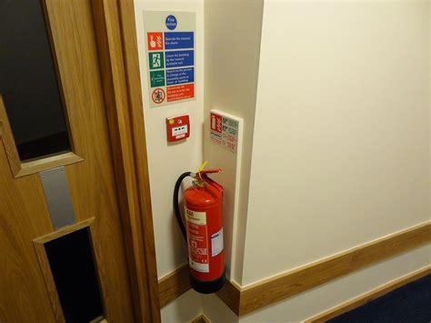Four smoke detectors, two carbon monoxide detectors, several first aid kits, and a rather large fire extinguisher. Fire extinguisher - Wikipedia