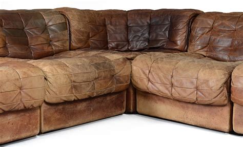 Make your own patchwork sofa upholstery from wood planks and fabric scrap, or reupholster old sofa into new. Seven-Section Leather Patchwork Sofa by De Sede at 1stdibs