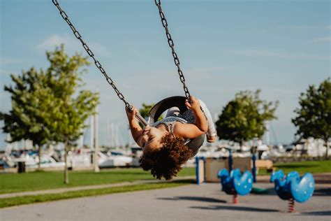Download Girl On Tire Playground Swing Wallpaper