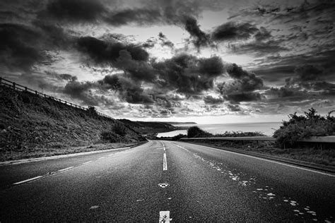 A Road Winds Off Into The Distance Black And White By Macinivnw On