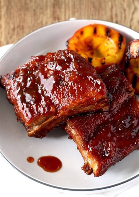 Bourbon And Peach Bbq Ribs Bbq Ribs Peach Bbq Sauce Slow Cooked Meals