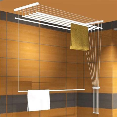 And when not in use racks collapse under an attractive top shelf that can hold supplies or decorative. Airavie Ceiling-Mounted Clothes Drying Rack with Seven ...