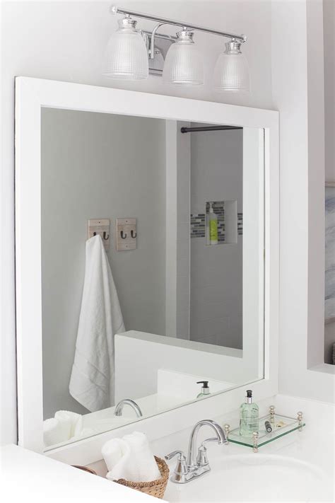 The first step with the bathroom remodel was to remove everything from the bathroom. How to Frame a Bathroom Mirror - Easy DIY project