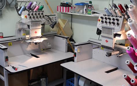 2 Melco EMT10t industrial embroidery machines w/ Melco Designshop & accessories