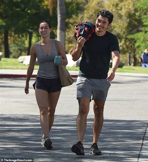 Who is henry golding's wife, liv lo? Henry Golding and wife Liv Lo smile after a workout at the ...