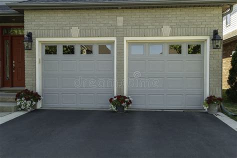 Two Separate Garages In One House Stock Photo Image Of Landscaping