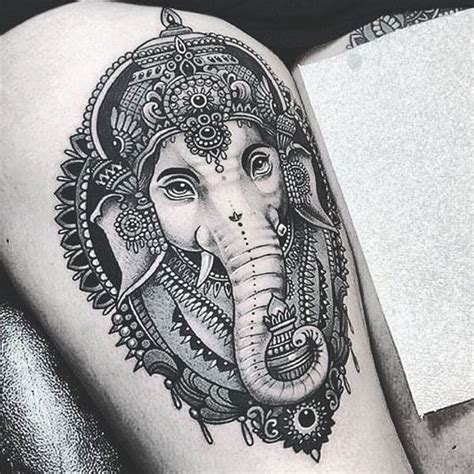 Ganesha Thigh Tattoo