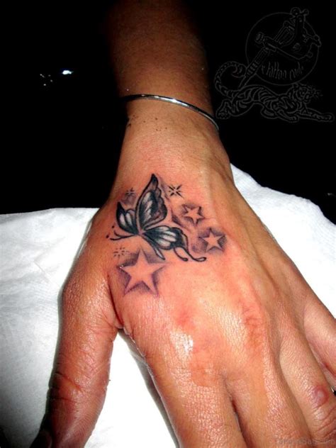 Star butterfly tattoo on right back shoulder. 29 Star Tattoos On Hand