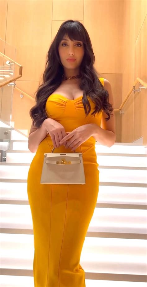 nora fatehi is all fired up in a gorgeous yellow body con dress in her latest video bollywood