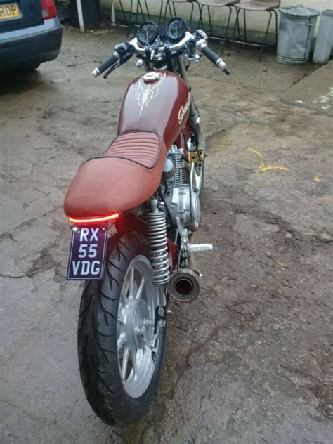 The main goal is to make it bigger, better, safer. YAMAHA YBR 125 CAFE RACER flat tracker bobber chopper ...