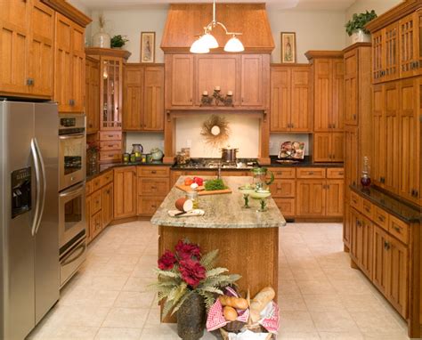 Quartersawn oak cabinets are shown to advantage in this evocative kitchen that calls for texture. Quarter Sawn Oak Kitchen