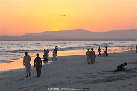 Photo Of People On Beach At Sunset Sunsets Salalah Dhofar Oman