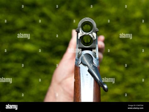Open Under And Over Double Barrel Shotgun Looking Down Through The