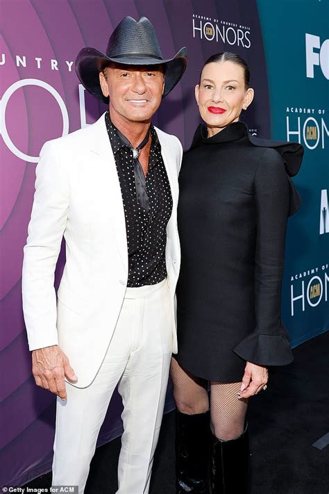 Tim Mcgraw Oozes Cool In White Suit Alongside Wife Faith Hill In Black