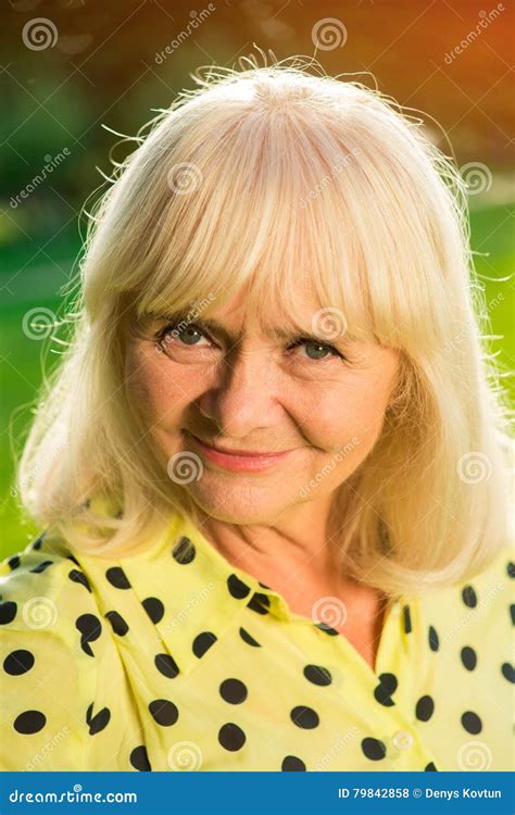 Portrait Of Smiling Elderly Woman Stock Photo Image Of Outdoor