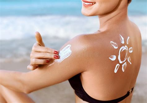 Woman Applying Sunscreen Cream On Tanned Shoulder Skincare Body Sun Protection Suncream Stock