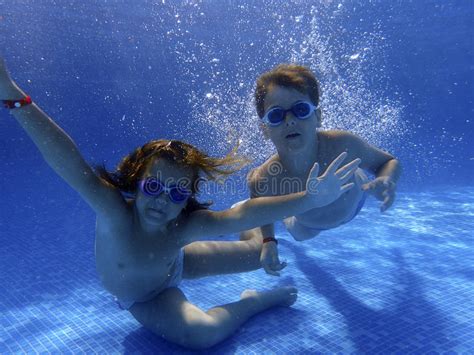 Kids Underwater In The Pool Stock Photo Image Of Pretty Holiday