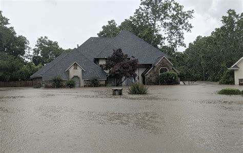 Preparing for a flood download article. The Latest: Residents seek shelter after river floods homes