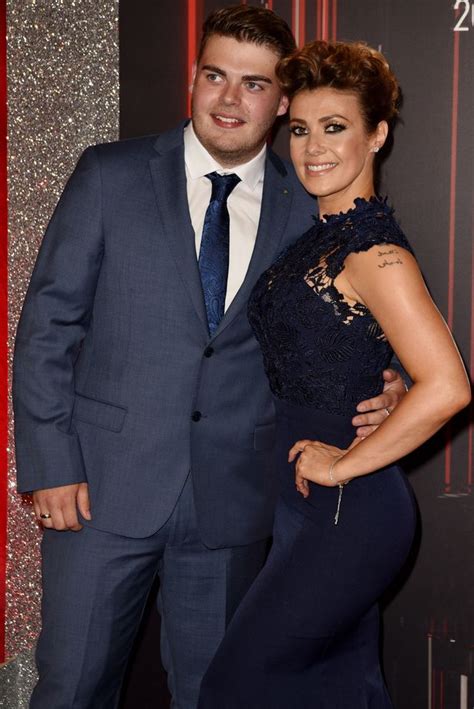 Stunning Kym Marsh Supported By Son David Cunliffe Jr As She Attends British Soap Awards In