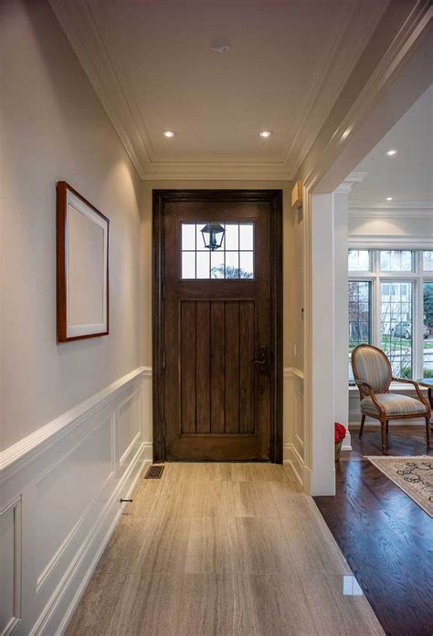 Entrance to this home features ship lap walls & ceilings that are off set with a brilliant blue barn. 18 Entrance Hall Lighting Ideas You Should Check Out ...