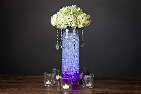 Check out our flower top candle selection for the very best in unique or custom, handmade pieces from our shops. DIY Centerpiece with Flowers Hydro Orbs and Candles