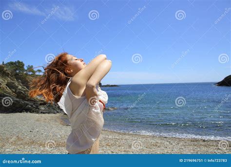 Woman Undressing On The Beach Ready To Bath Stock Image Image Of