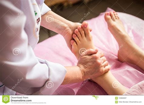 Foot Massage In Spa Salon Closeupyoung Woman Having Feet Massage In