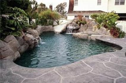 It's natural beauty and versatility makes it a winner around any inground swimming pool taking a custom look to an entirely different level. Swimming Pool Landscaping Ideas: Pictures, Backyard, Rocks ...