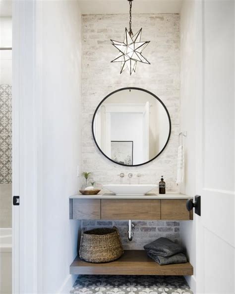 The bathroom is one of the only rooms in a multibodied household where we're expected and encouraged to lock ourselves inside. 12 Powder Room Light Fixture Ideas | HGTV