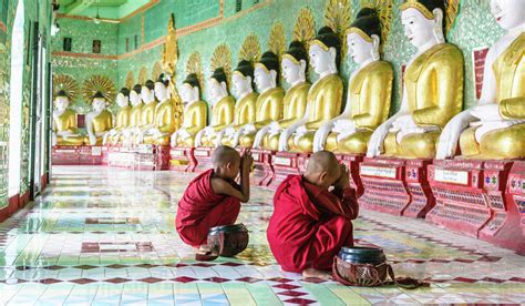 Asian Buddhist Monks Praying In Temple Mingun Saigang Myanmar