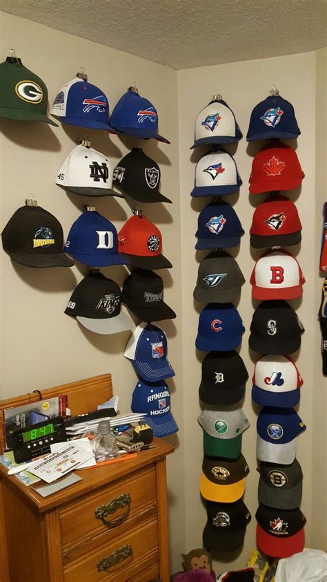 Hang Your Hats With Binder Clips And Push Pins In The Wall Displays The Hats Amazing Wall
