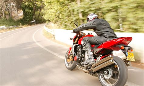 Kawasaki introduced the z1 (900) motorcycle in 1972 as the first of the kawasaki z series. KAWASAKI Z1000 - 2003, 2004 - autoevolution