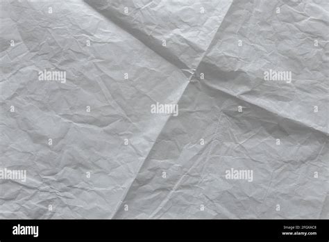 Fondo De Textura De Papel Blanco Arrugado Y Plegado Fotografía De Stock