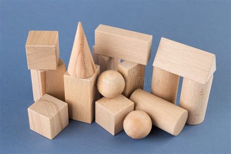 Wooden Geometric Shapes On A Blue Stock Photo Image Of Construction
