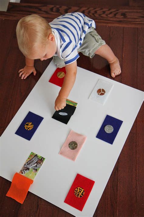 Zoo Animal Peek-a-Boo Board | Preschool activities, Educational toys