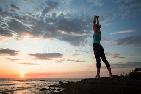 Yoga Woman Doing Exercises On The Atlantic Ocean Coast At Twilight Porto Stock Image Image Of