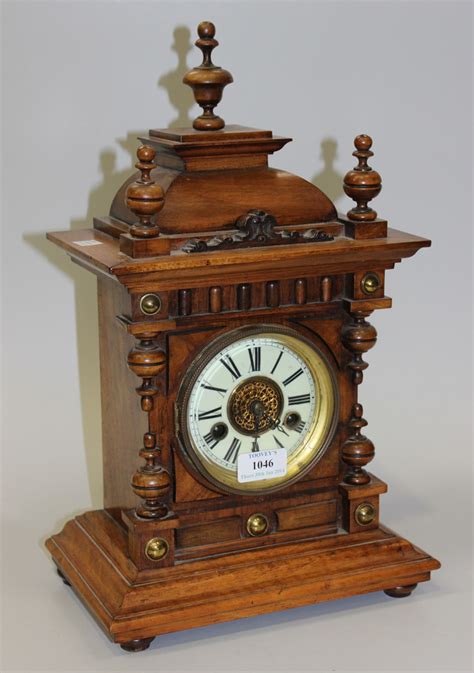 A Late 19th Century German Walnut Mantel Clock With Eight Day Movement