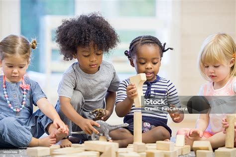 Kids Playing With Building Blocks Stock Photo Download Image Now